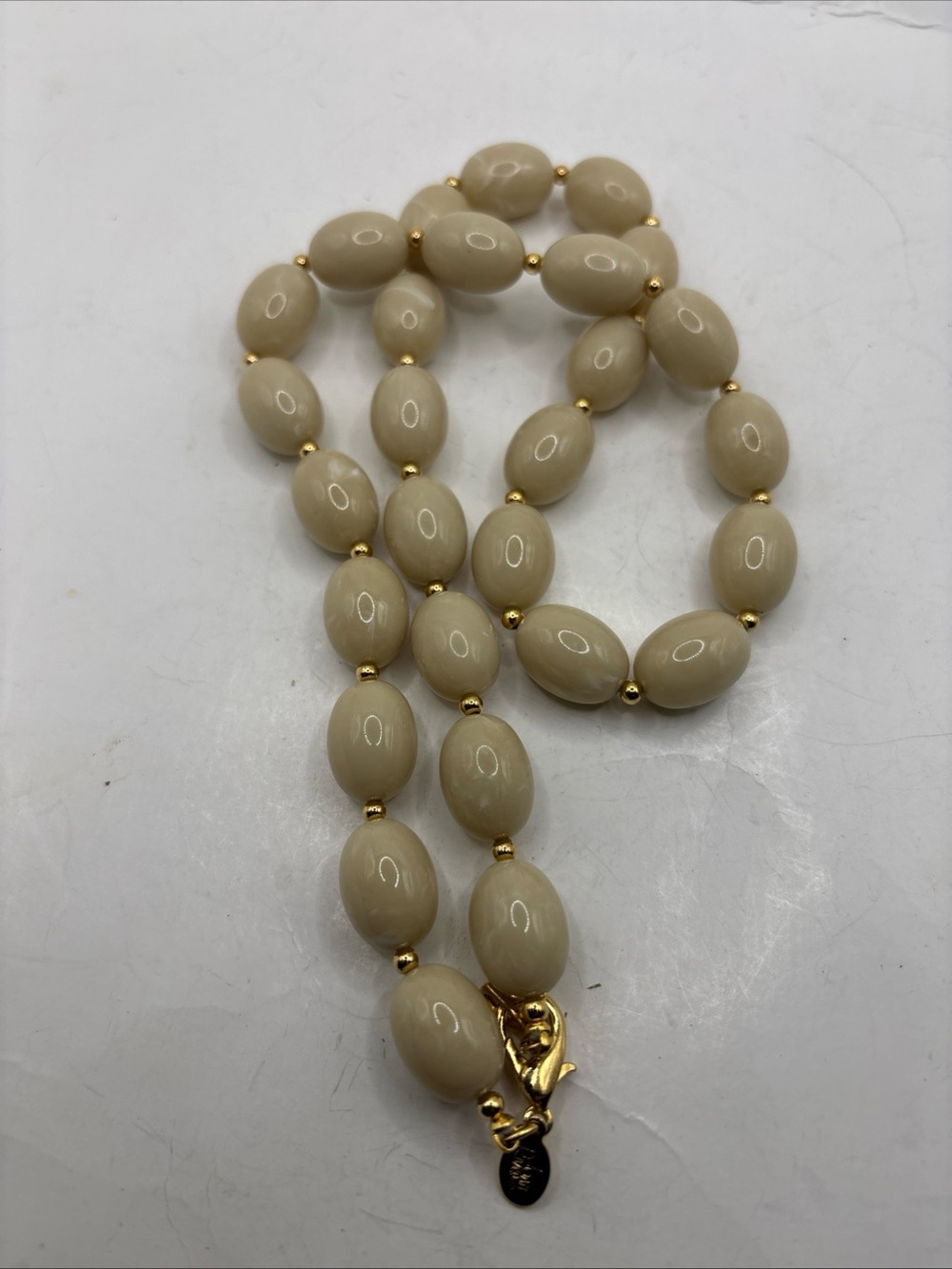 Vintage Joan Rivers Beige Oval Bead Necklace with Gold Accents